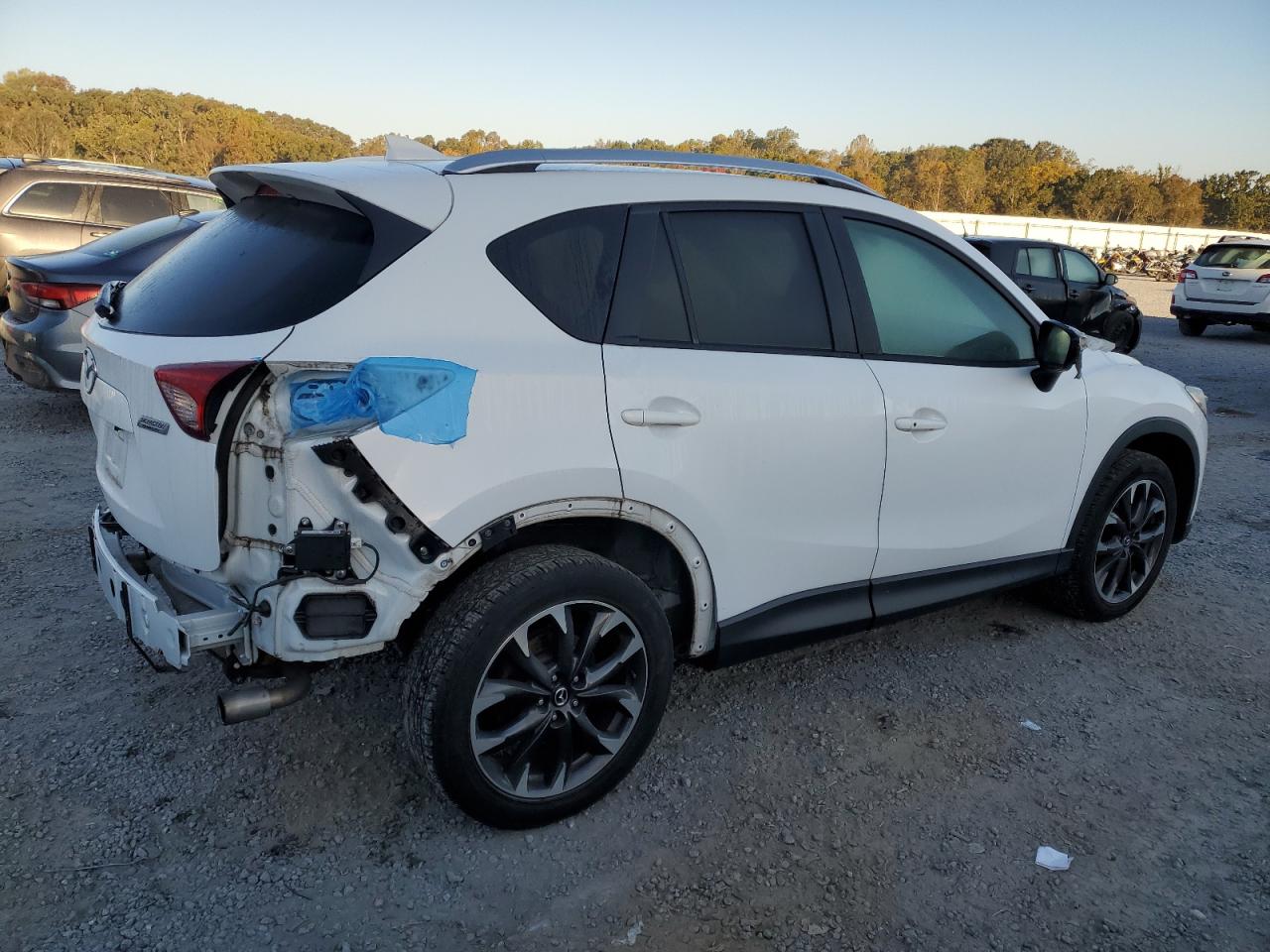 2016 Mazda CX-5 VIN JM3KE4DY1G0815276 Copart auction photo, rear end damage thumbnail 3