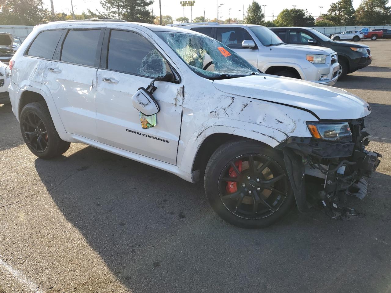 2016 Jeep Grand Cherokee VIN 1C4RJFDJ7GC451364 Copart auction photo, all over damage thumbnail 4