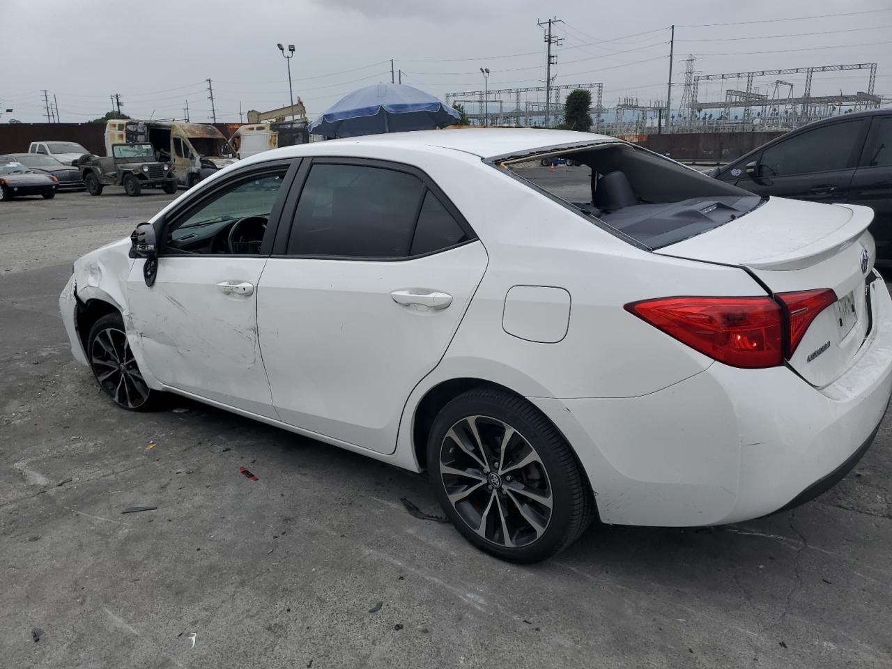 2019 Toyota Corolla VIN 5YFBURHE1KP878997 Copart auction photo, rear end / all over damage thumbnail 2