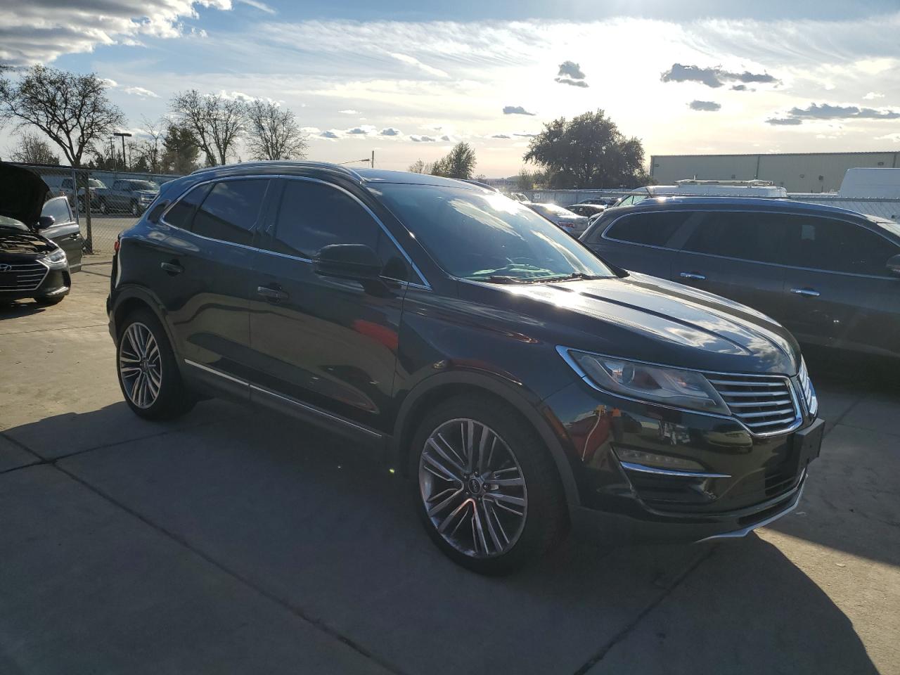 2015 Lincoln MKZ VIN 5LMTJ2AH6FUJ12676 Copart auction photo, minor dent/scratches damage thumbnail 4