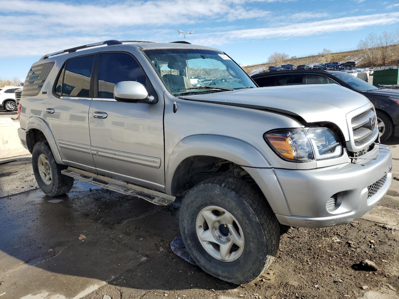 2001 Toyota Sequoia VIN 5TDBT44A21S033672 Copart auction photo, side / rear end damage thumbnail 4