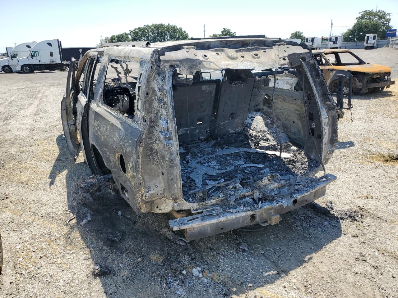 2016 Chevrolet Suburban VIN 1GNSCHKC3GR114786 Copart auction photo, burn damage thumbnail 2