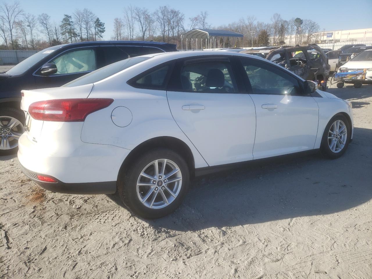 2016 Ford Focus VIN 1FADP3F2XGL284503 Copart auction photo, front end / side damage thumbnail 3