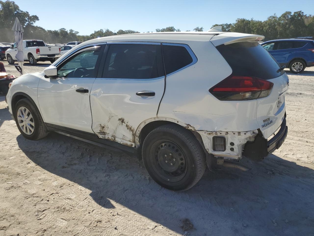 2017 Nissan Rogue VIN 5N1AT2MT7HC785702 Copart auction photo, side / rear end damage thumbnail 2