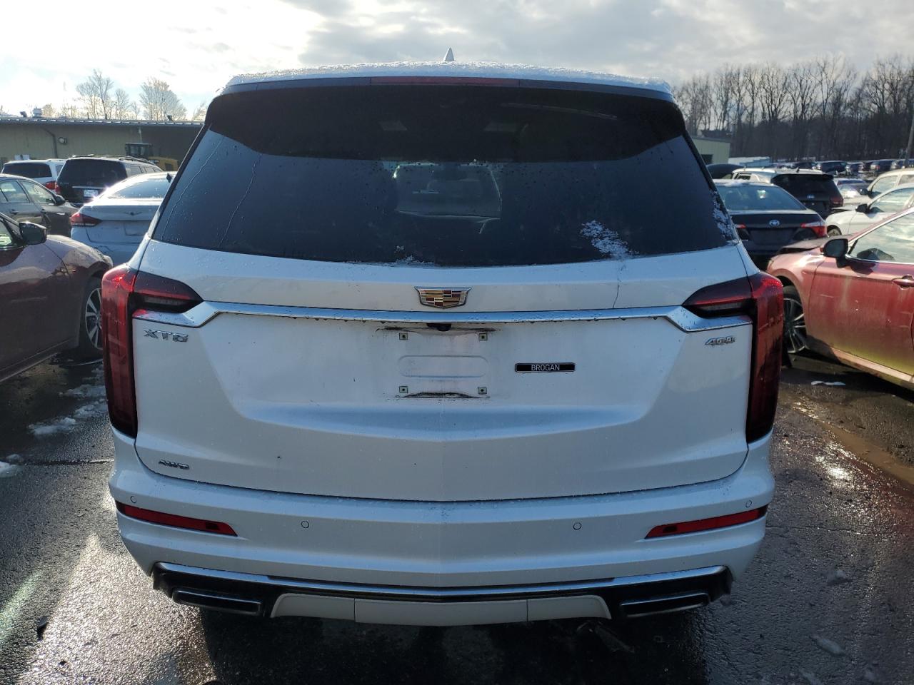 2022 Cadillac XT6 VIN 1GYKPDRS1NZ124470 Copart auction photo, front end / minor dent/scratches damage thumbnail 6