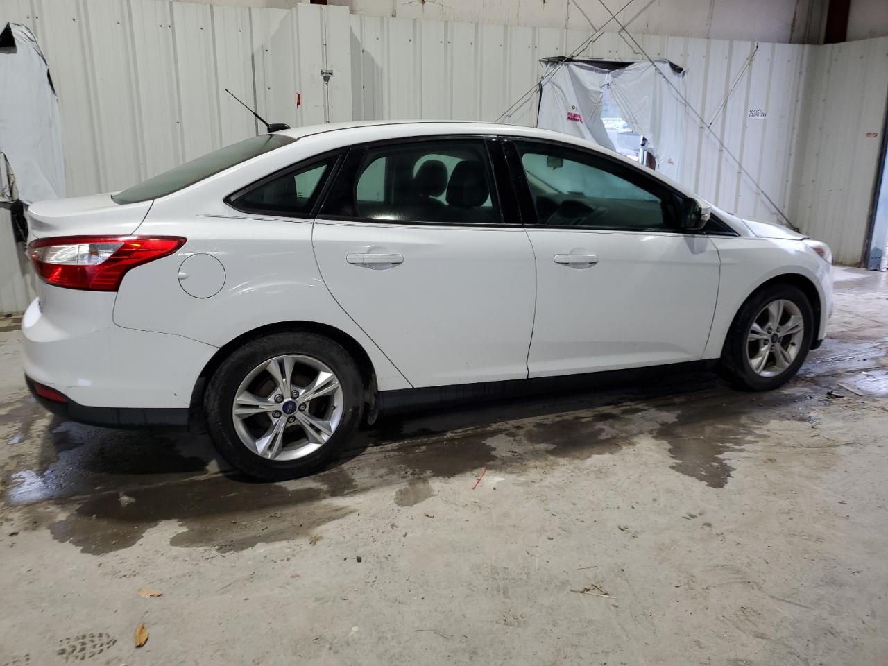 2014 Ford Focus VIN 1FADP3F22EL324778 Copart auction photo, minor dent/scratches damage thumbnail 3