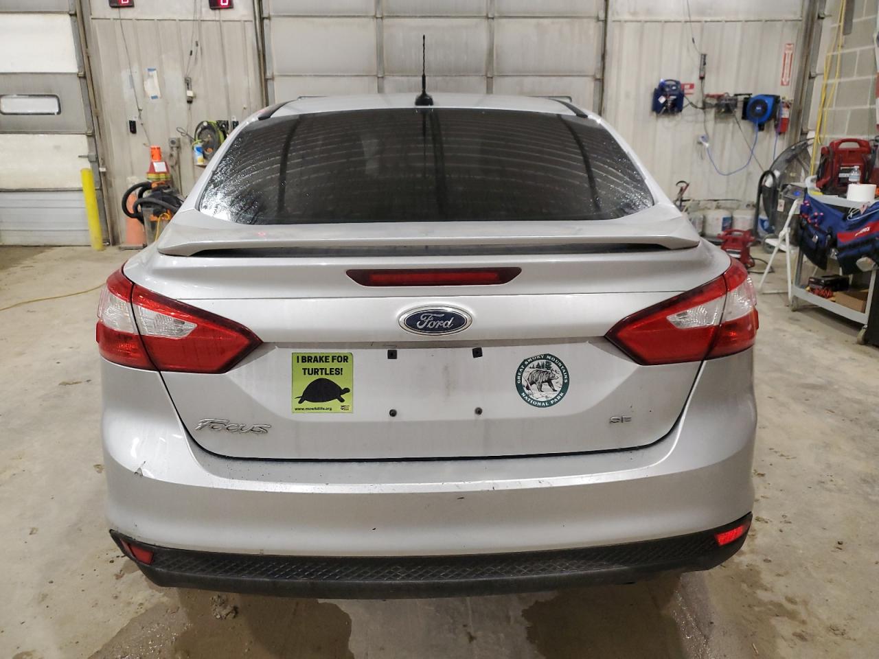 2012 Ford Focus VIN 1FAHP3F21CL154069 Copart auction photo, front end / rear end damage thumbnail 6