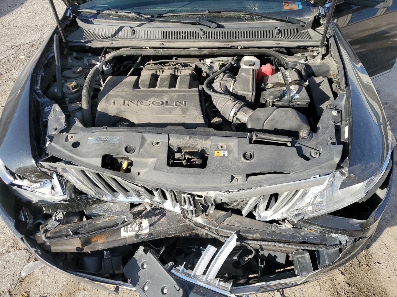 2010 Lincoln MKS VIN 1LNHL9ER6AG608907 Copart auction photo, front end damage thumbnail 11