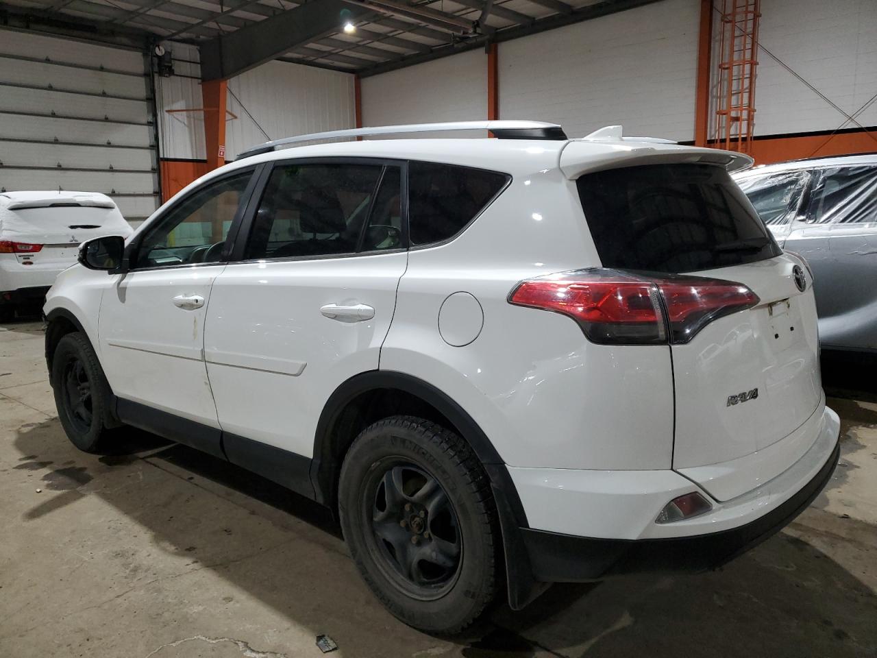 2018 Toyota RAV 4 VIN 2T3BFREV8JW856305 Copart auction photo, front end / minor dent/scratches damage thumbnail 2