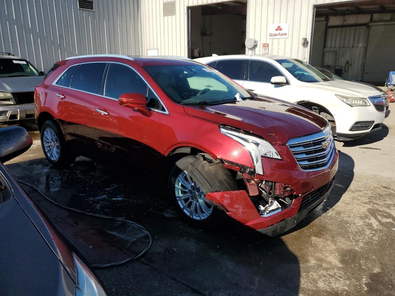 2018 Cadillac XT5 VIN 1GYKNARS2JZ118708 Copart auction photo, front end / all over damage thumbnail 4