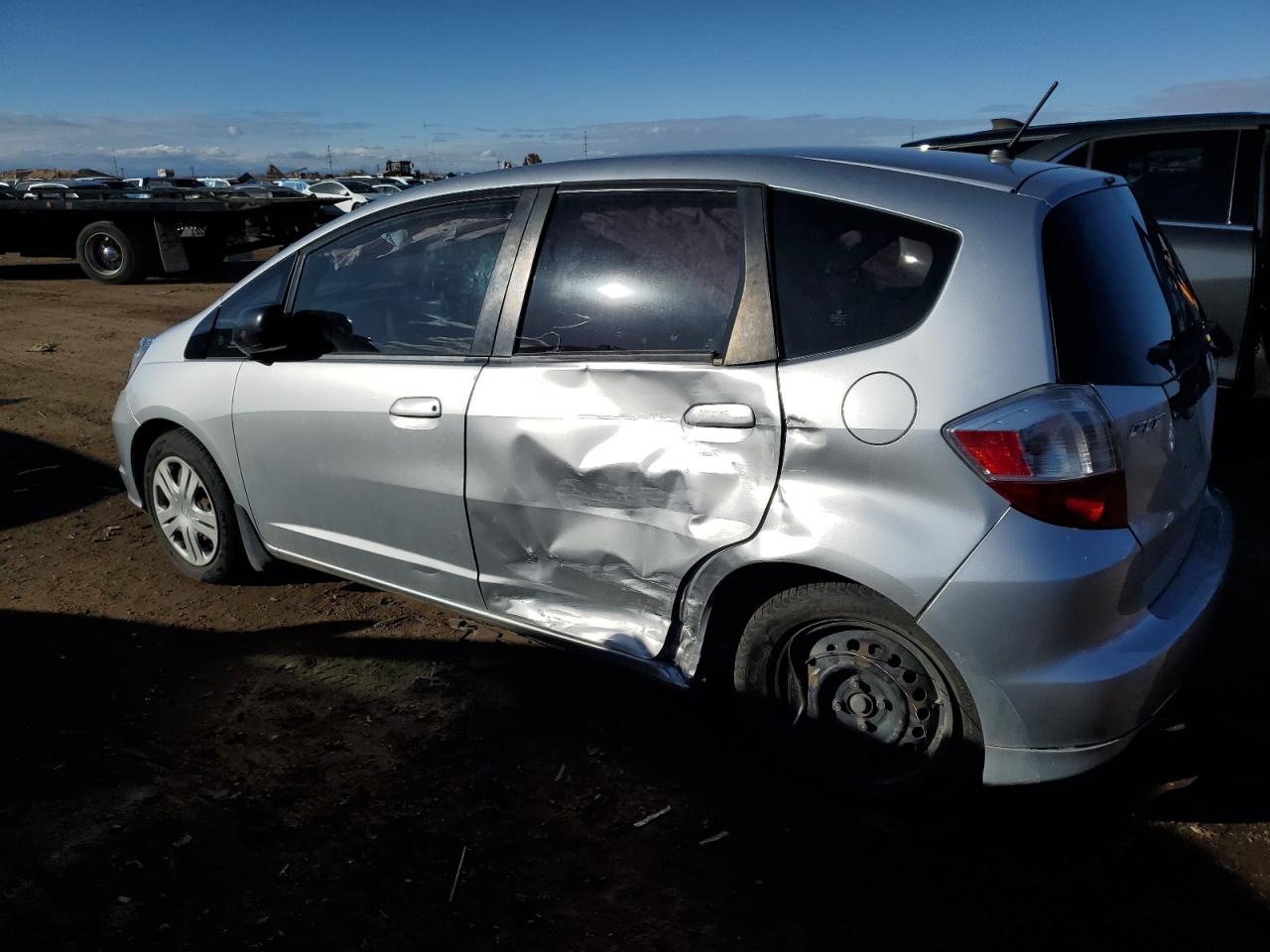 2011 Honda Fit VIN JHMGE8H31BS004254 Copart auction photo, side damage thumbnail 2
