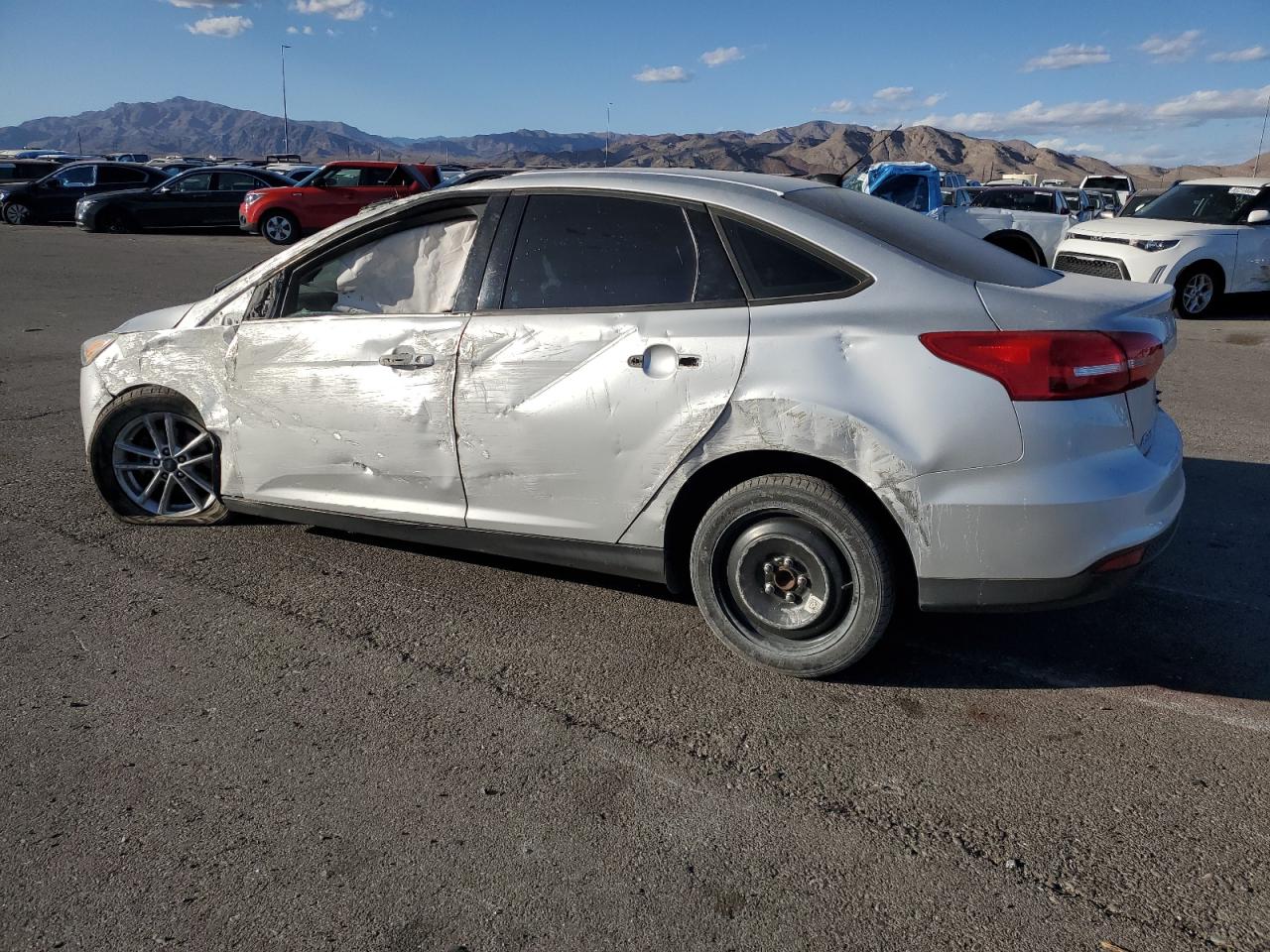 2016 Ford Focus VIN 1FADP3F26GL289830 Copart auction photo, all over damage thumbnail 2