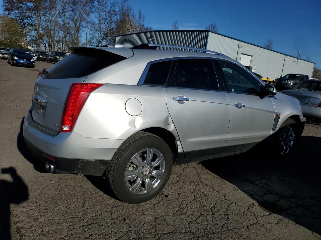 2016 Cadillac SRX VIN 3GYFNEE37GS574653 Copart auction photo, front end / side damage thumbnail 3