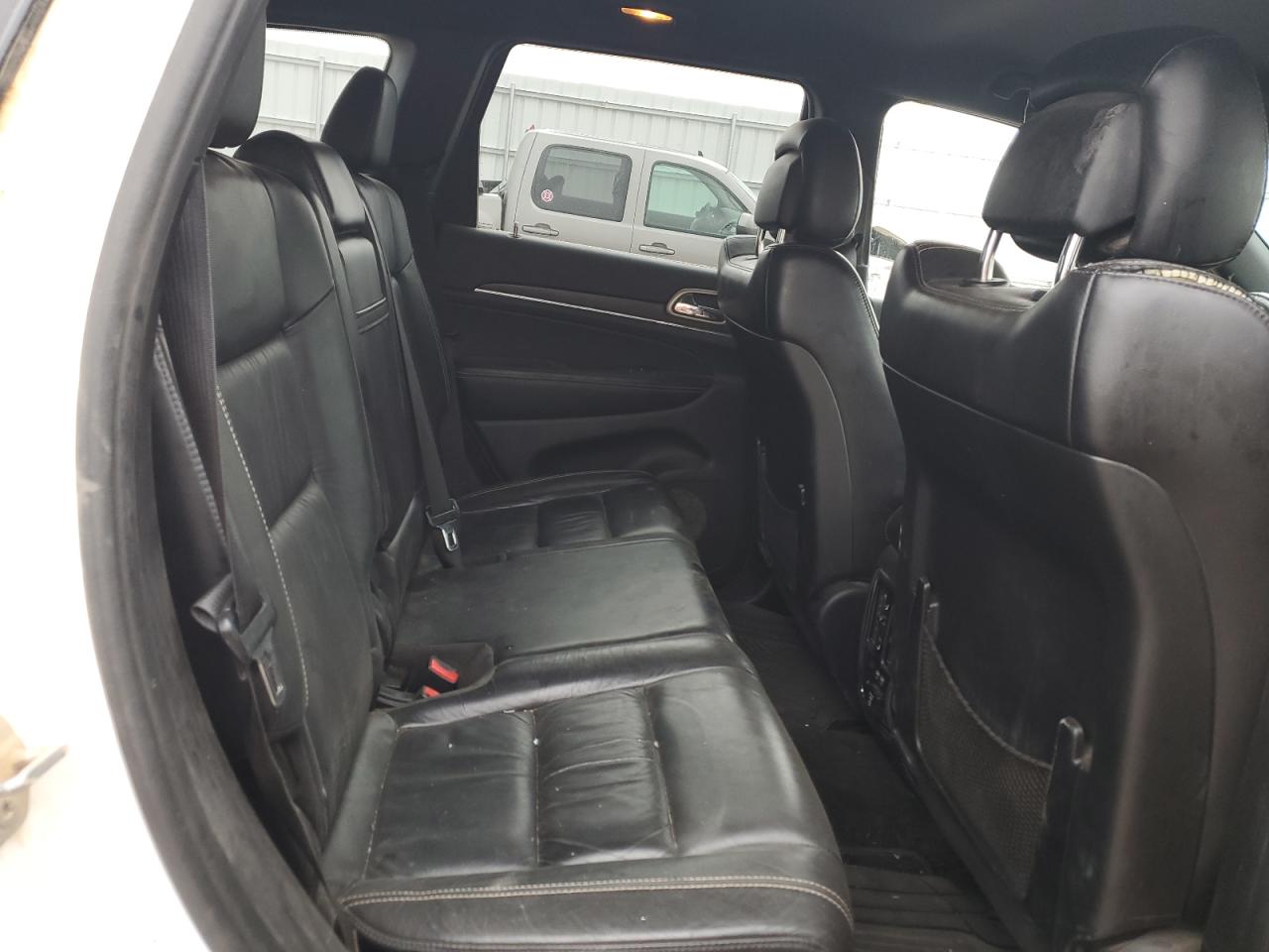 2015 Jeep Grand Cherokee VIN 1C4RJFBG8FC158773 Copart auction photo, side / front end damage thumbnail 11