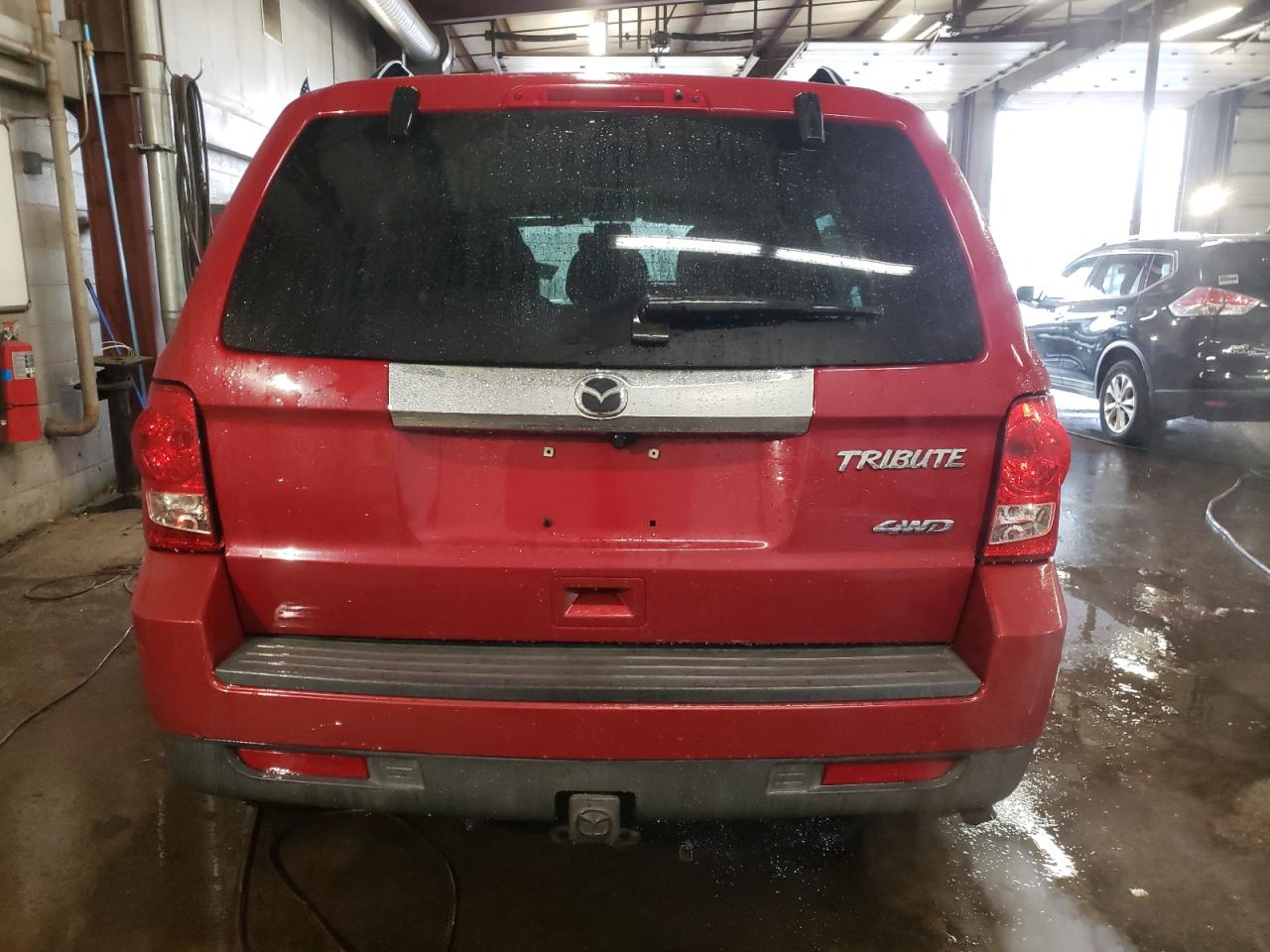 2010 Mazda Tribute VIN 4F2CY9GG8AKM07504 Copart auction photo, front end / minor dent/scratches damage thumbnail 6