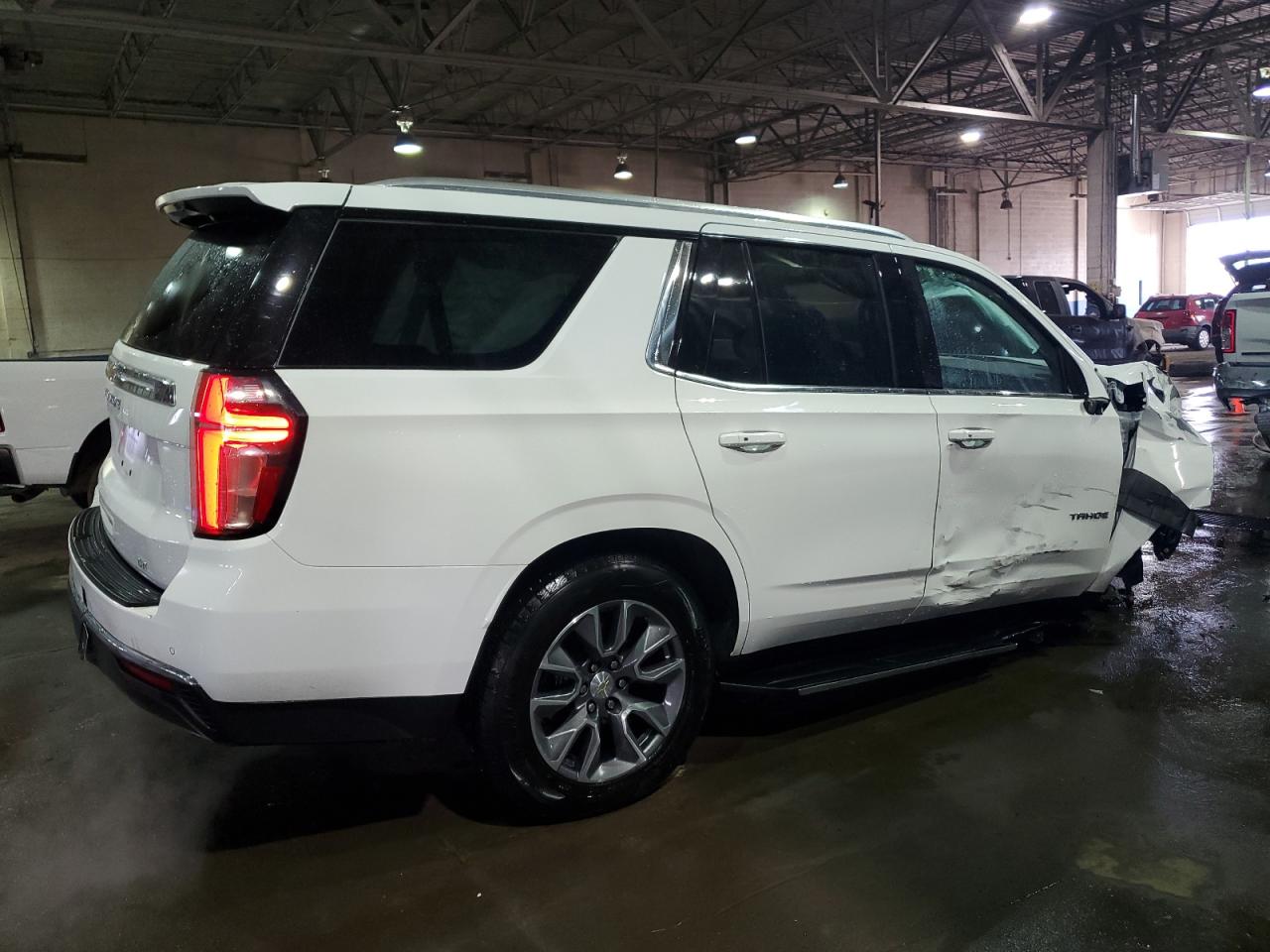 2023 Chevrolet Tahoe VIN 1GNSCNKD0PR298284 Copart auction photo, front end / side damage thumbnail 3