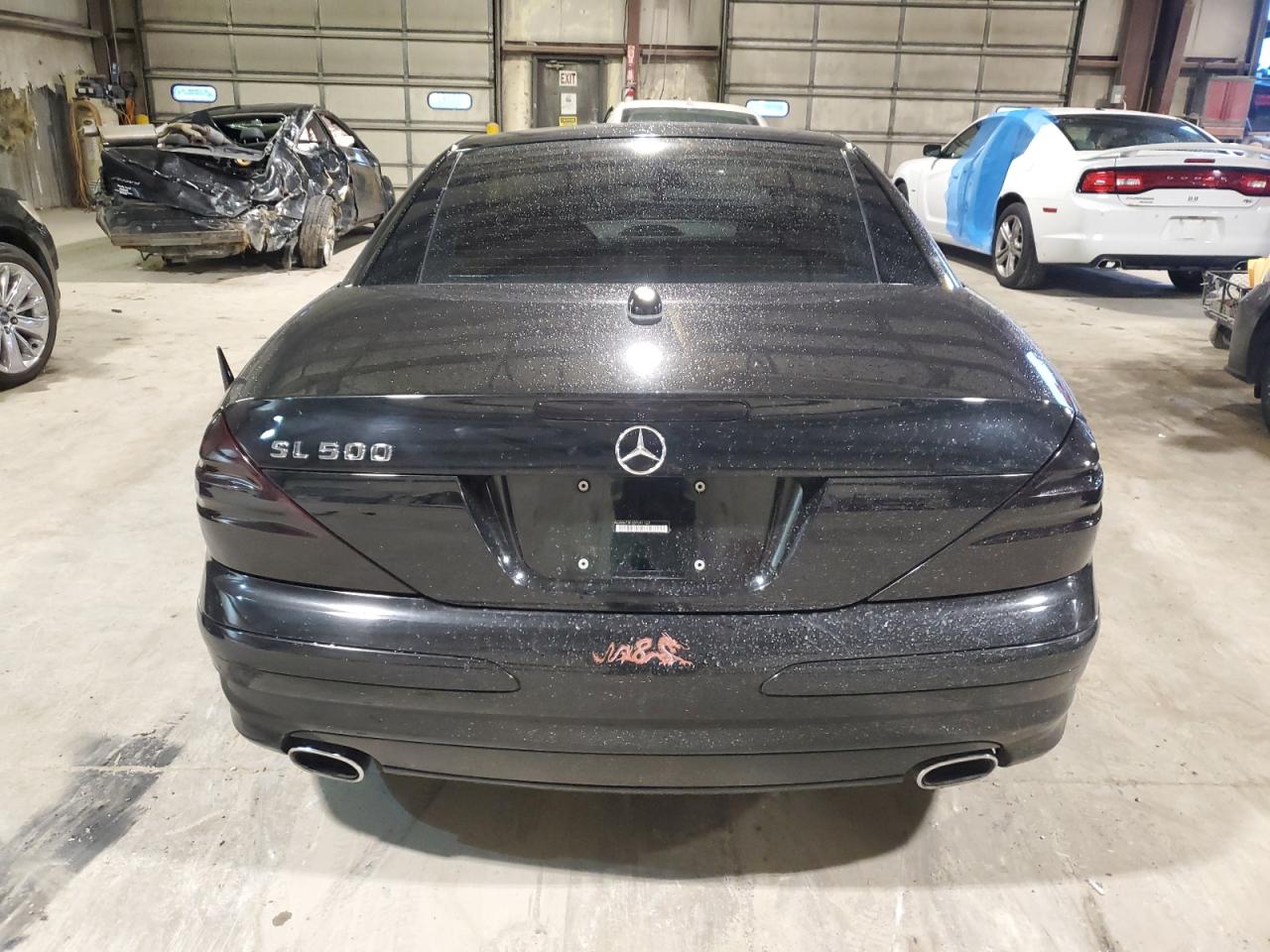 2005 Mercedes-Benz SL-klasse VIN WDBSK75F35F091129 Copart auction photo, front end / minor dent/scratches damage thumbnail 6