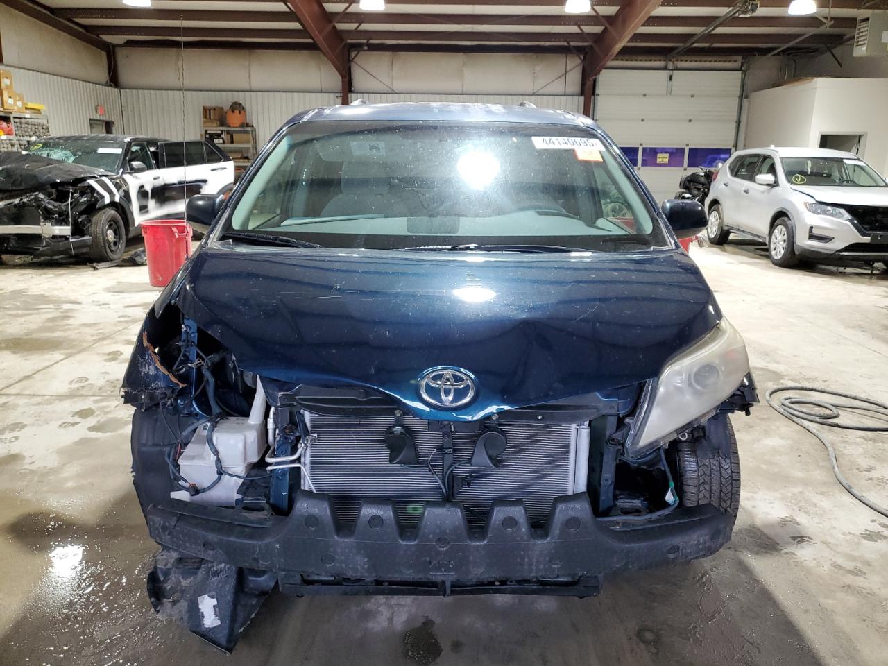 2011 Toyota Sienna VIN 5TDKK3DC5BS092764 Copart auction photo, front end damage thumbnail 5