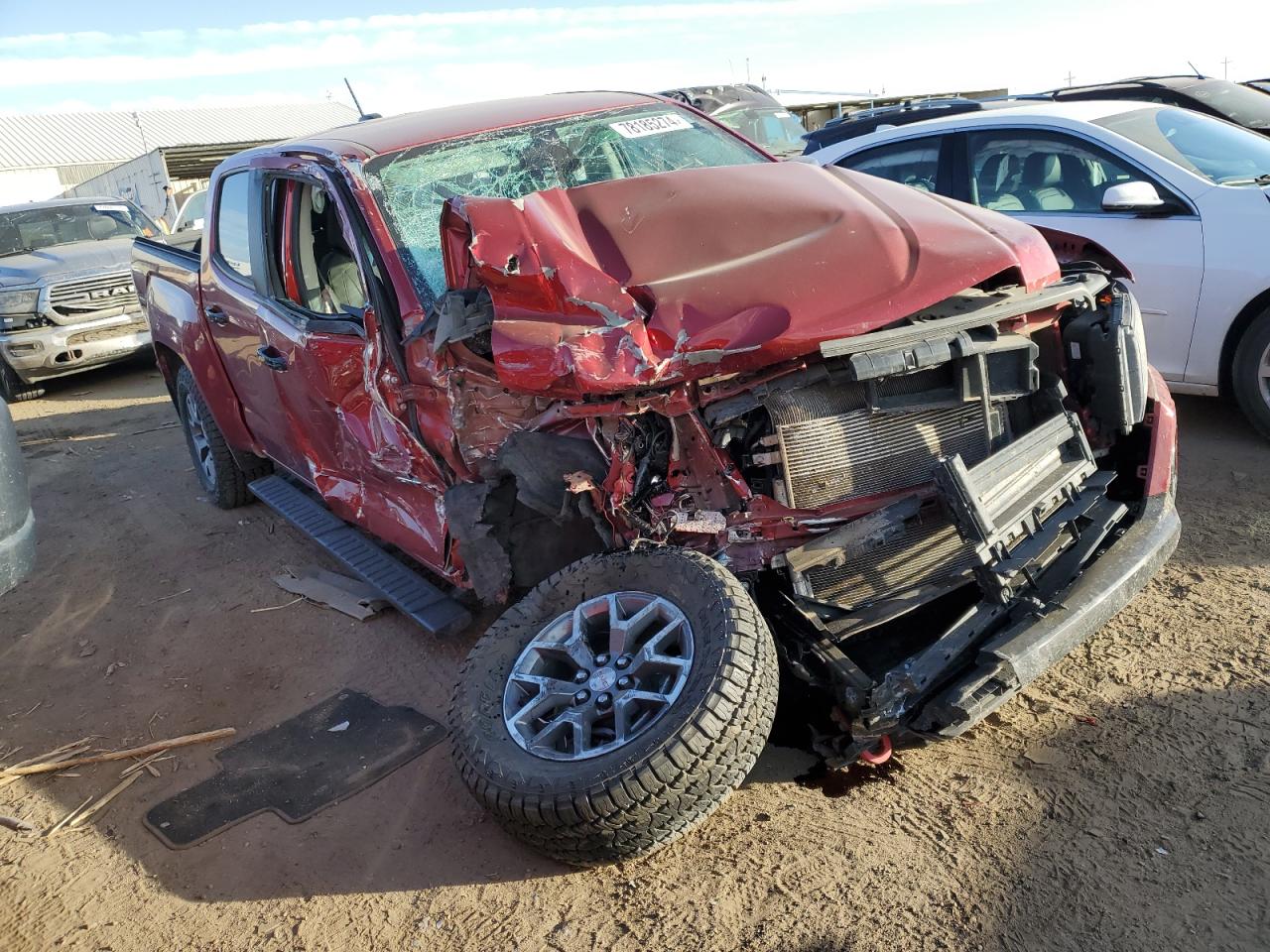 2021 GMC Canyon VIN 1GTG6FEN2M1213584 Copart auction photo, front end / side damage thumbnail 4