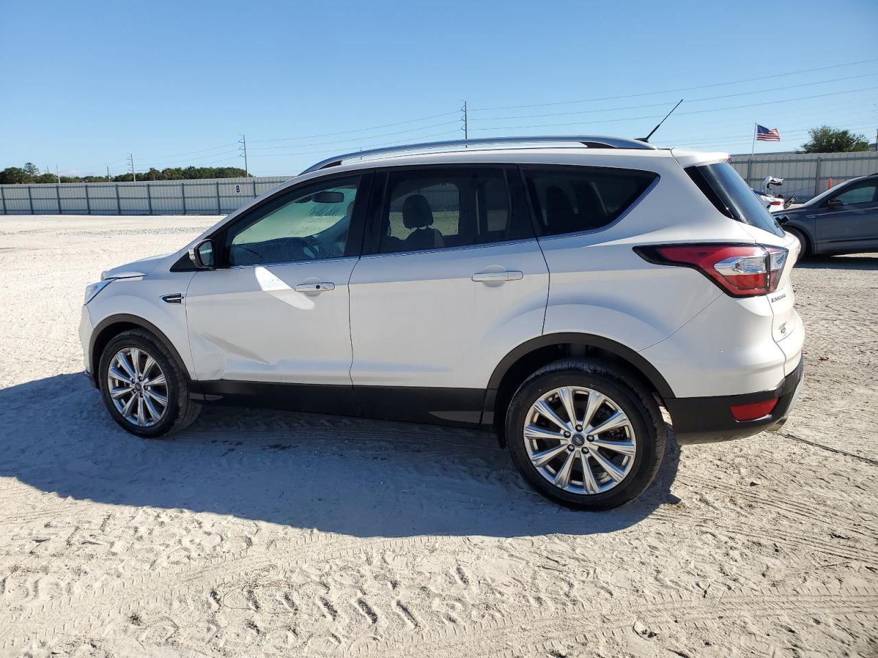 2017 Ford Escape VIN 1FMCU0J91HUD59923 Copart auction photo, side / front end damage thumbnail 2