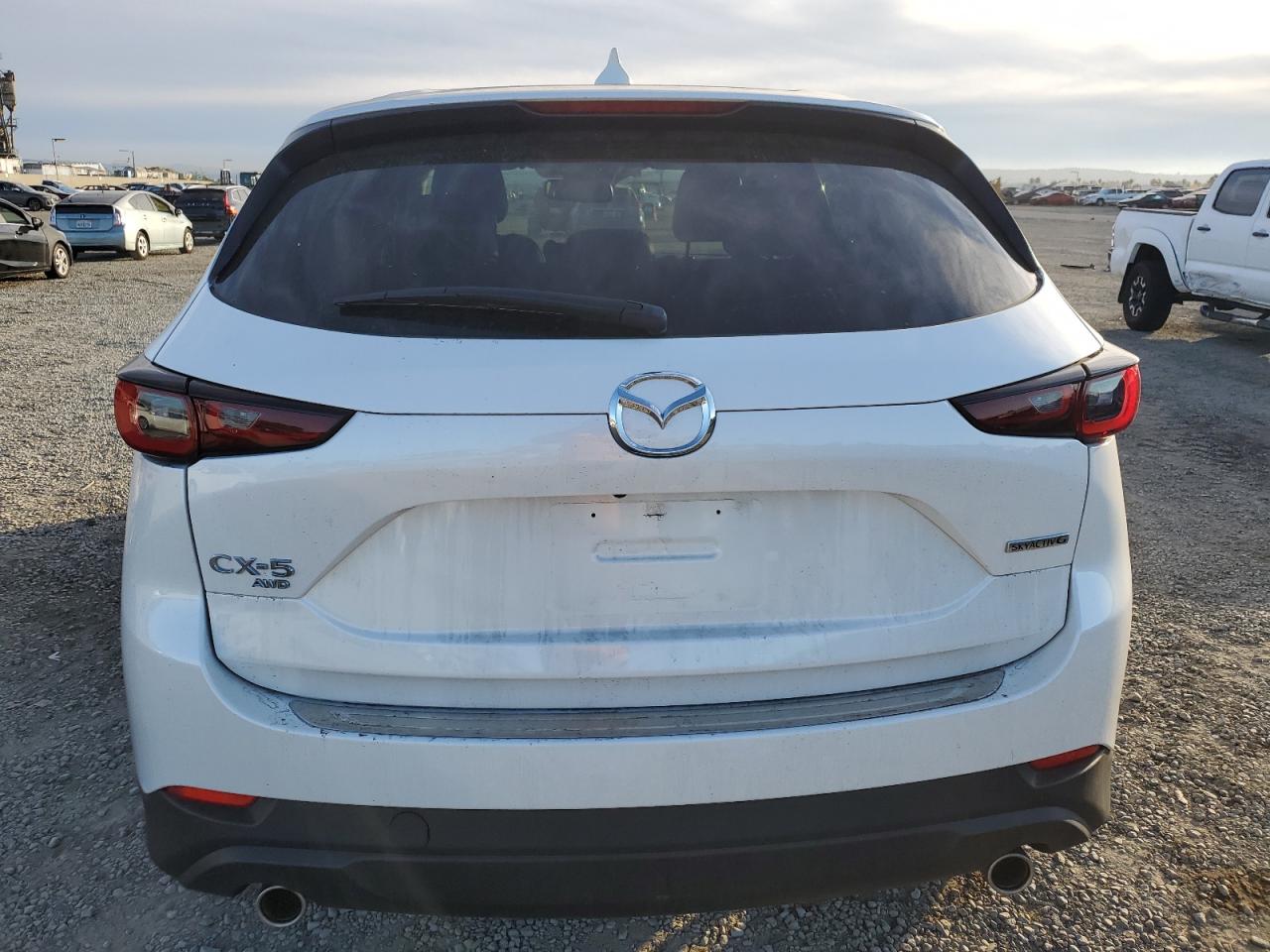 2022 Mazda CX-5 VIN JM3KFBDMXN0638495 Copart auction photo, rear end / side damage thumbnail 6