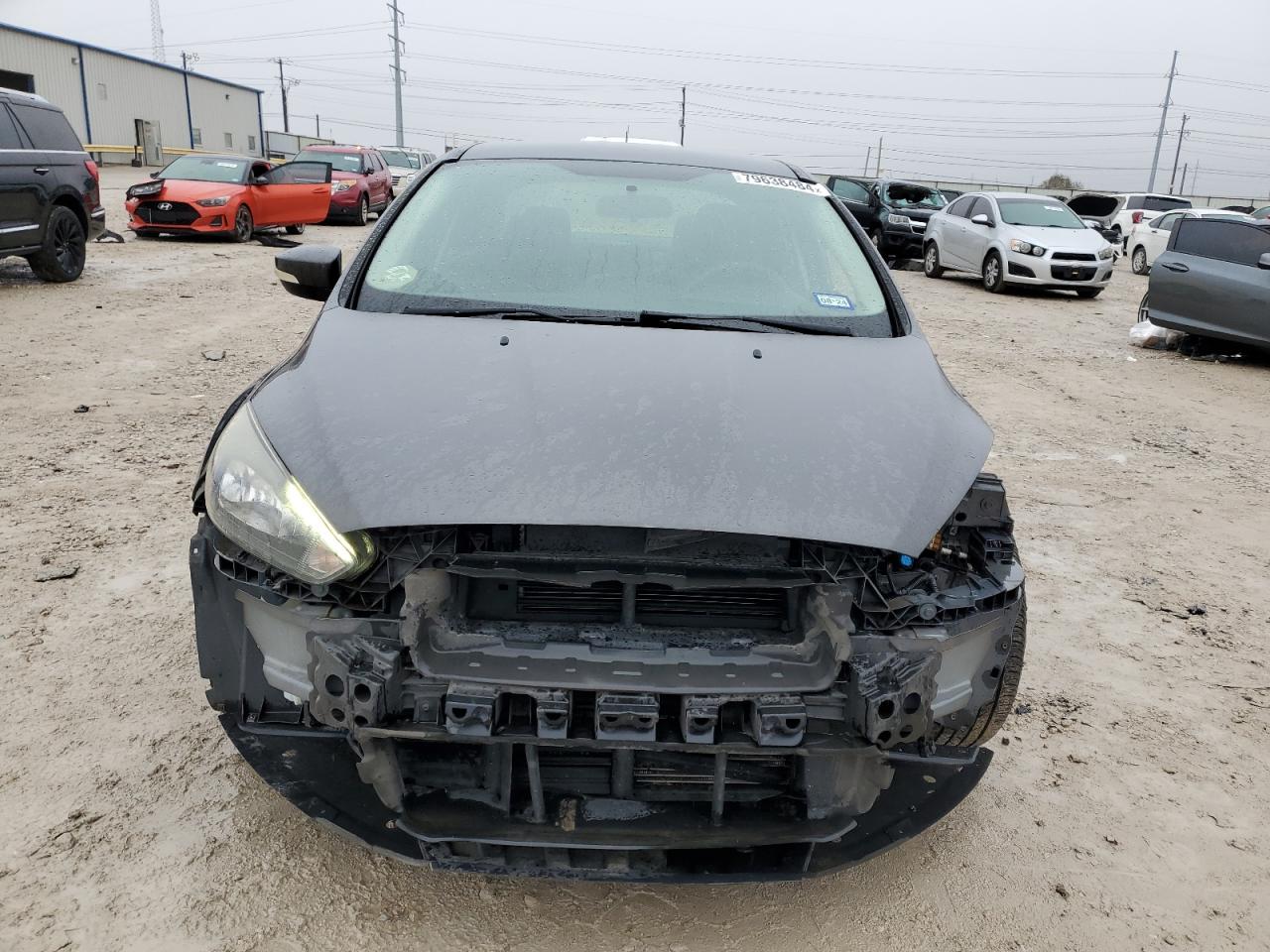 2017 Ford Focus VIN 1FADP3FE7HL290156 Copart auction photo, side / front end damage thumbnail 5