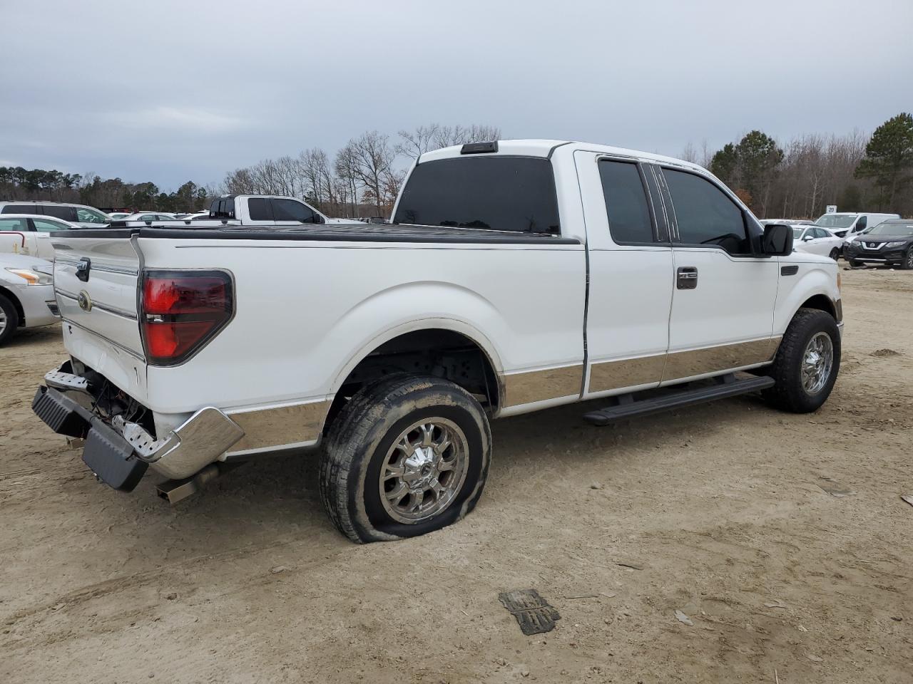 2013 Ford F-150 VIN 1FTEX1CM1DKF61209 Copart auction photo, rear end / minor dent/scratches damage thumbnail 3
