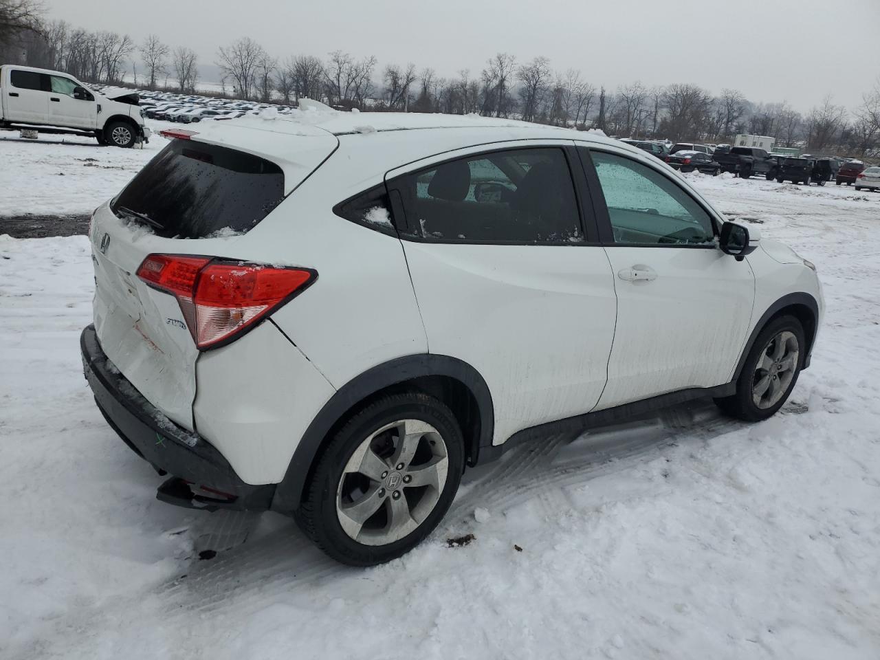 2016 Honda HR-V VIN 3CZRU6H58GM746700 Copart auction photo, rear end / minor dent/scratches damage thumbnail 3