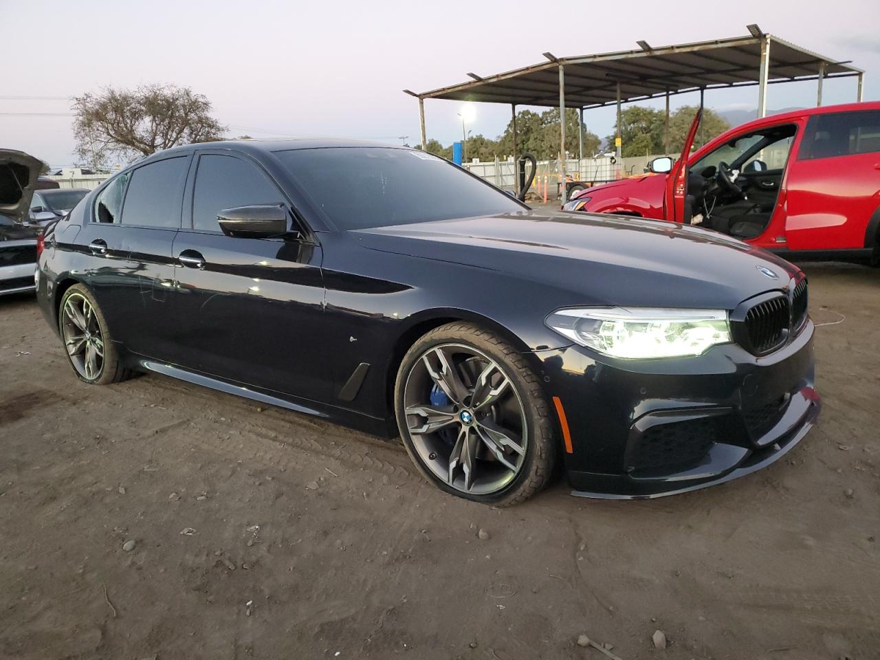 2018 BMW M5 VIN WBAJB9C5XJB036002 Copart auction photo, vandalism damage thumbnail 4