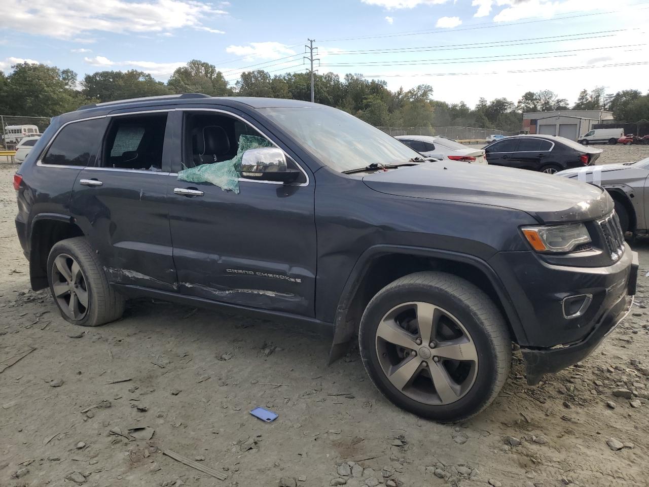 2014 Jeep Grand Cherokee VIN 1C4RJFCGXEC521409 Copart auction photo, all over / vandalism damage thumbnail 4