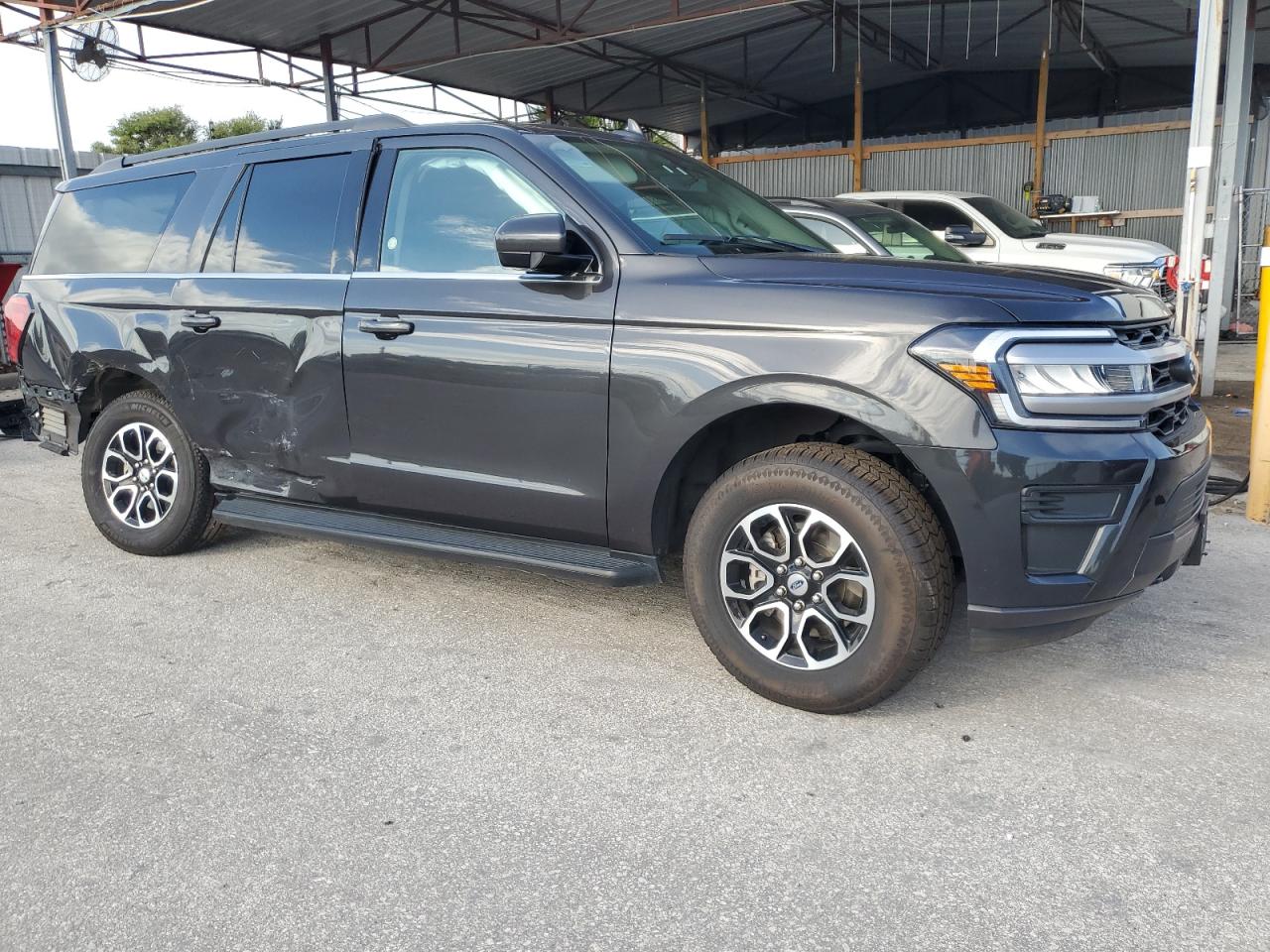 2023 Ford Expedition VIN 1FMJK1J89PEA16697 Copart auction photo, side / rear end damage thumbnail 4