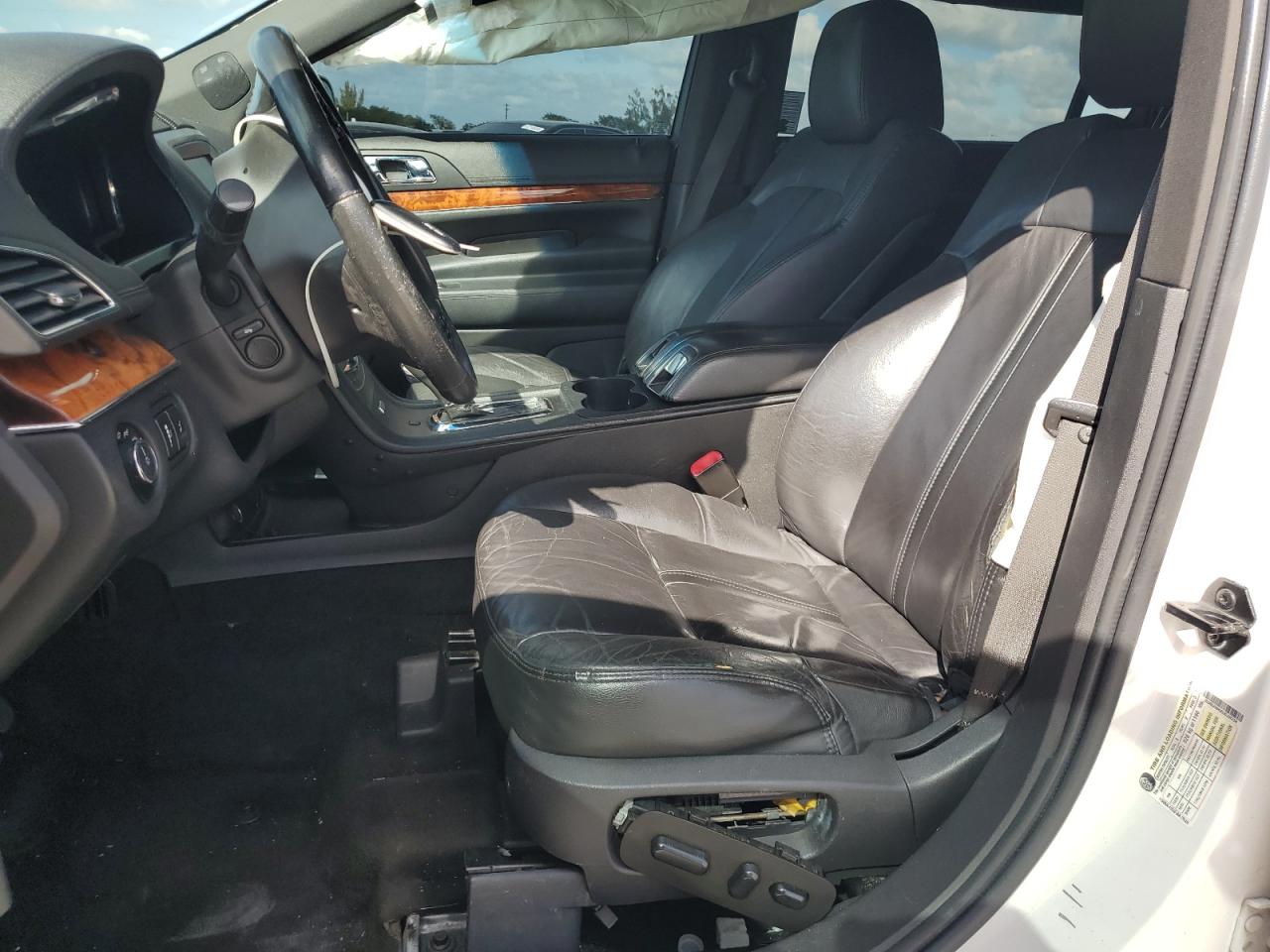 2014 Lincoln MKT VIN 2LMHJ5NK6EBL56238 Copart auction photo, all over damage thumbnail 7