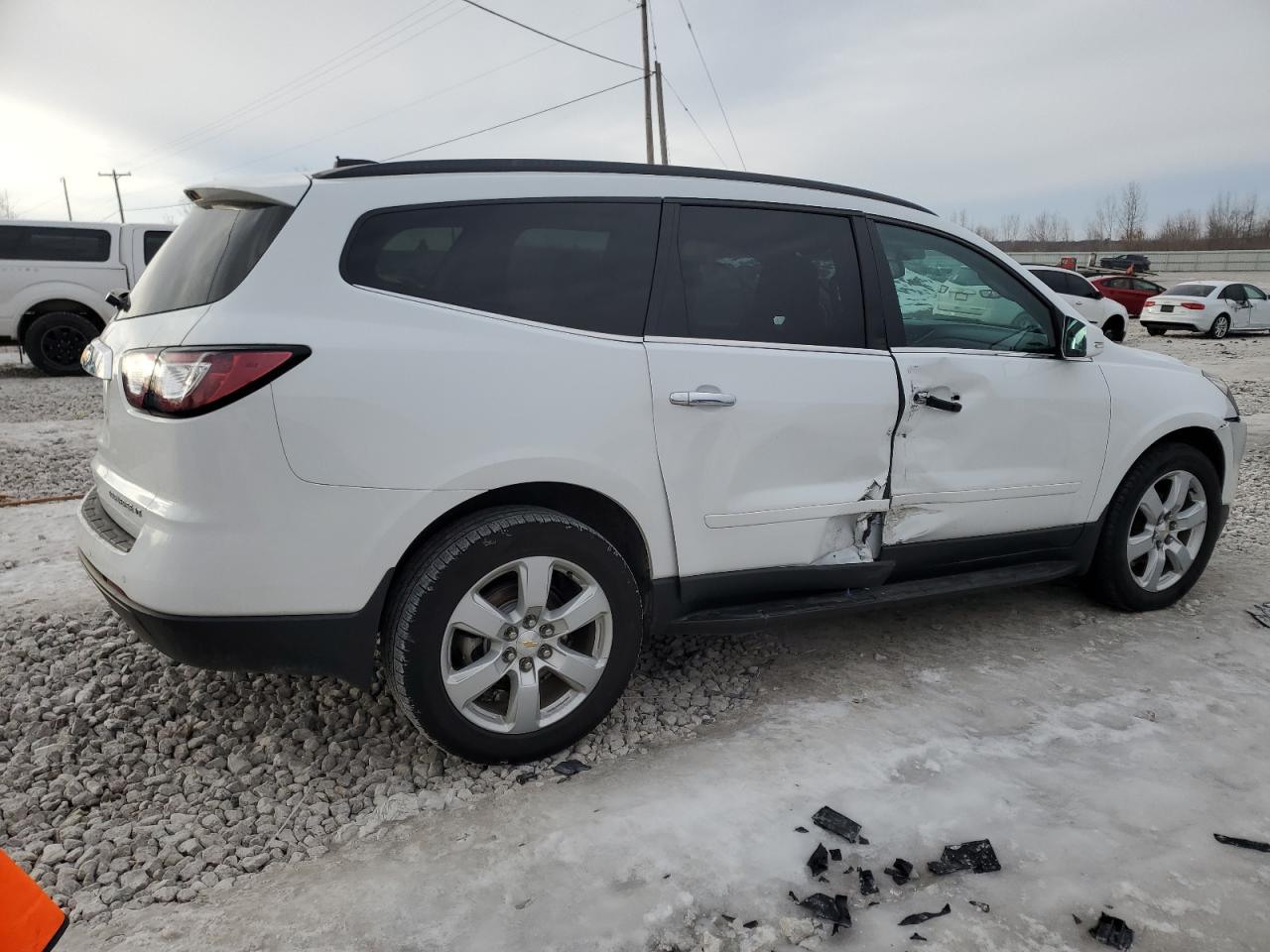 2016 Chevrolet Traverse VIN 1GNKVGKD5GJ296695 Copart auction photo, side / front end damage thumbnail 3