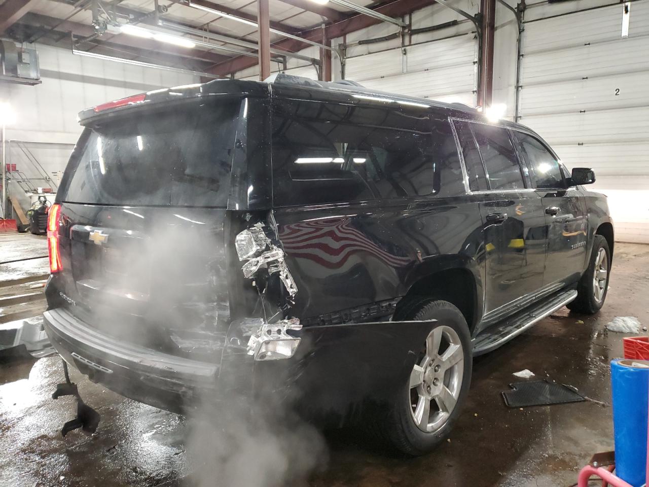 2015 Chevrolet Suburban VIN 1GNSKJKCXFR717159 Copart auction photo, side / rear end damage thumbnail 3