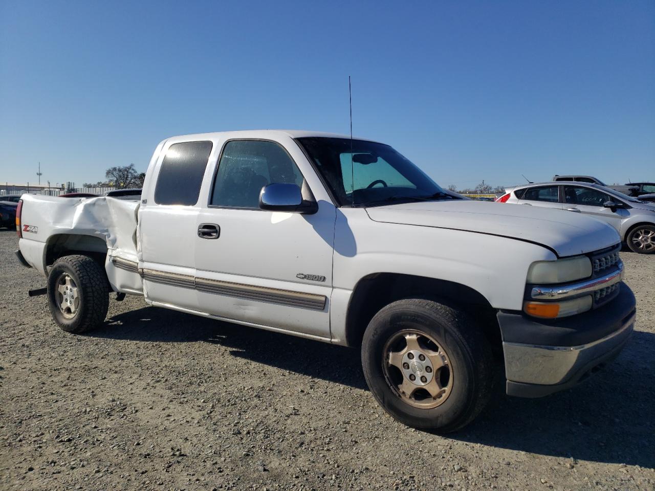 2001 Chevrolet Silverado VIN 1GCEK19T81E185616 Copart auction photo, rear end / side damage thumbnail 4