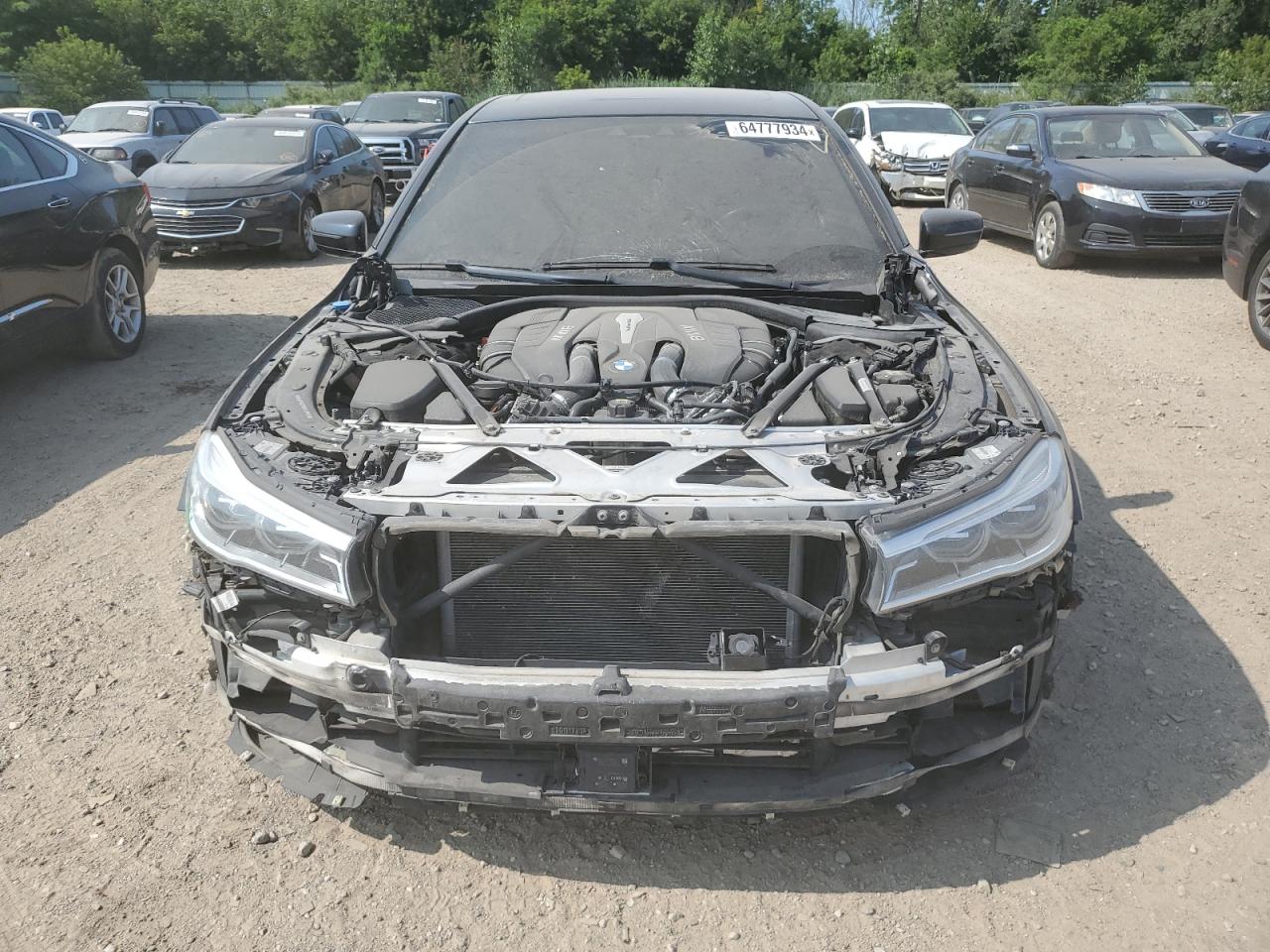 2016 BMW 7er VIN WBA7F2C56GG417833 Copart auction photo, front end damage thumbnail 5