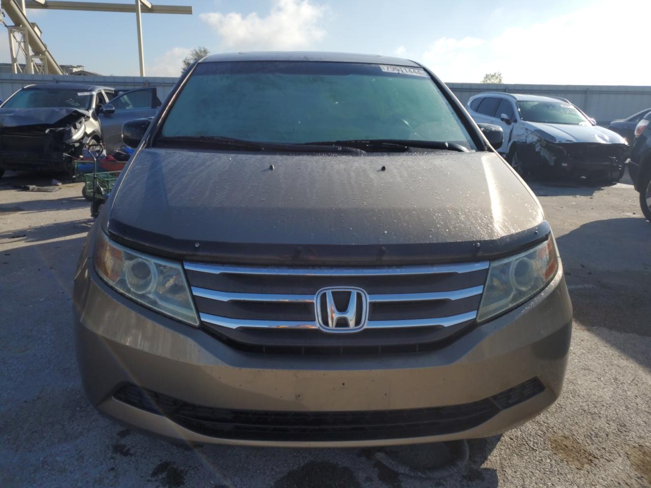 2011 Honda Odyssey VIN 5FNRL5H67BB060334 Copart auction photo, all over damage thumbnail 5