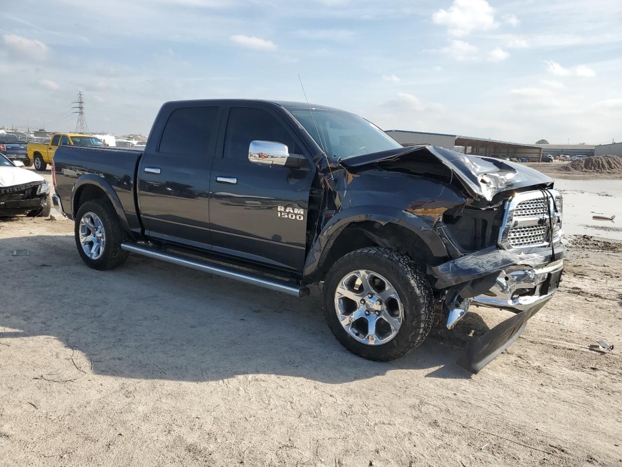 2015 RAM 1500 VIN 1C6RR7NTXFS711556 Copart auction photo, front end / side damage thumbnail 4