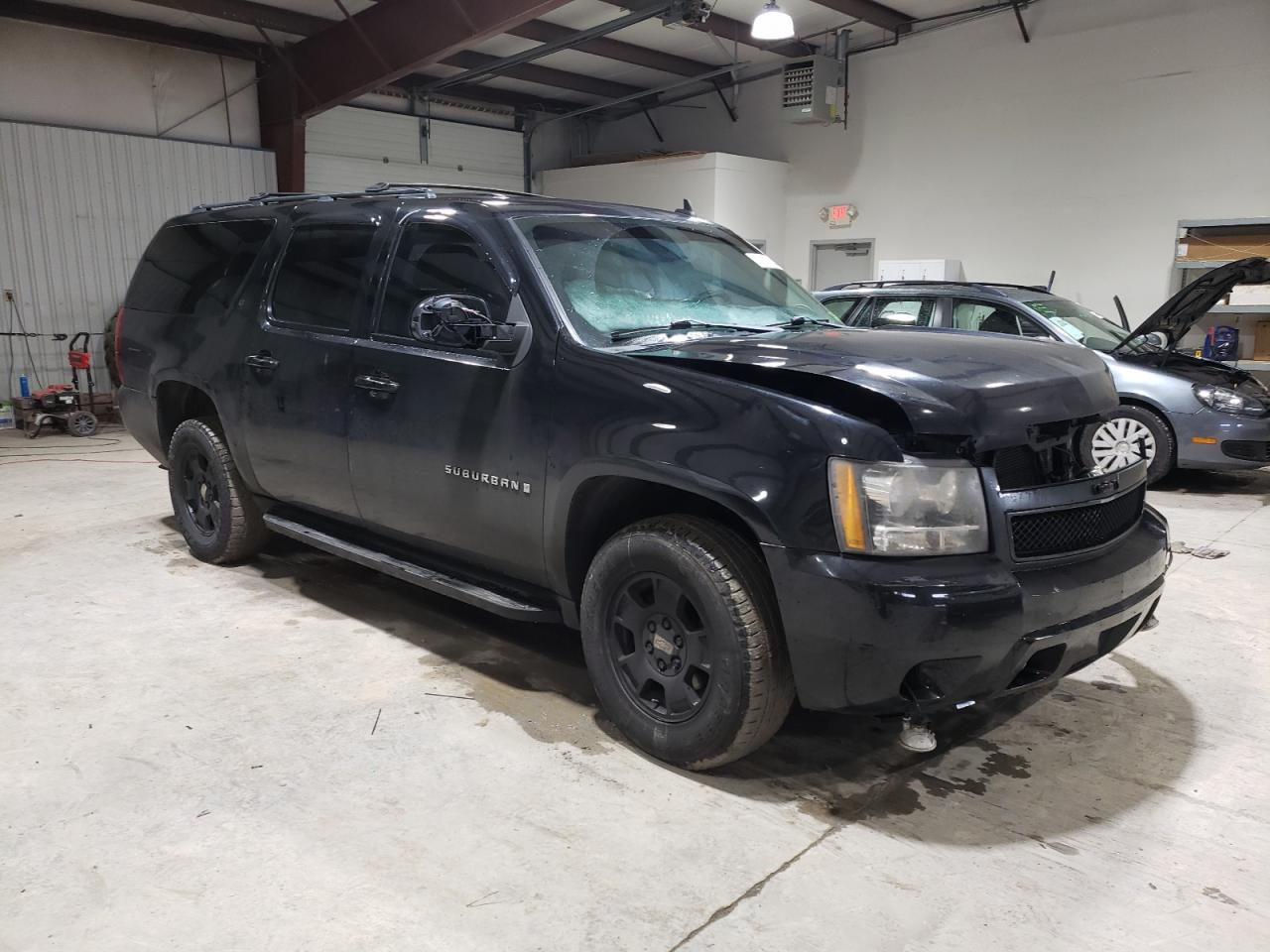 2009 Chevrolet Suburban VIN 1GNFK26319R210947 Copart auction photo, all over damage thumbnail 4