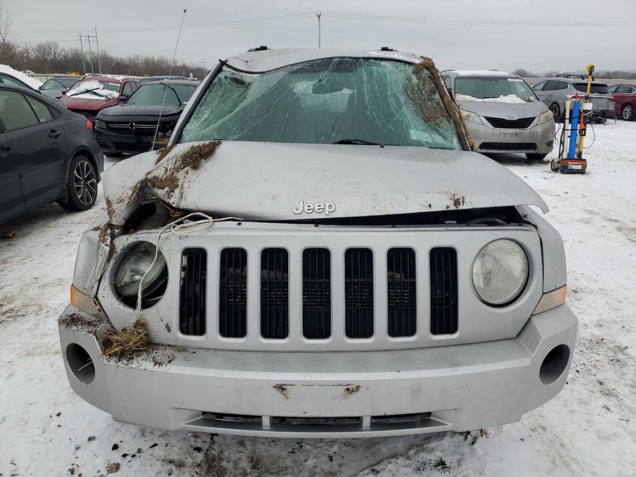 2010 Jeep Liberty (Patriot) VIN 1J4NF2GB4AD657962 Copart auction photo, all over damage thumbnail 5
