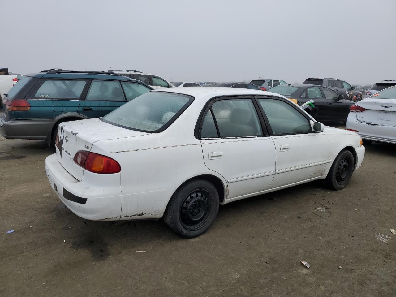 2001 Toyota Corolla VIN 2T1BR12EX1C401477 Copart auction photo, vandalism / minor dent/scratches damage thumbnail 3