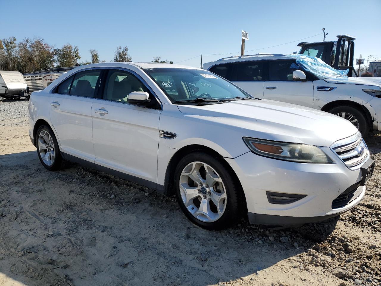 2012 Ford Taurus VIN 1FAHP2EW1CG112010 Copart auction photo, water/flood damage thumbnail 4