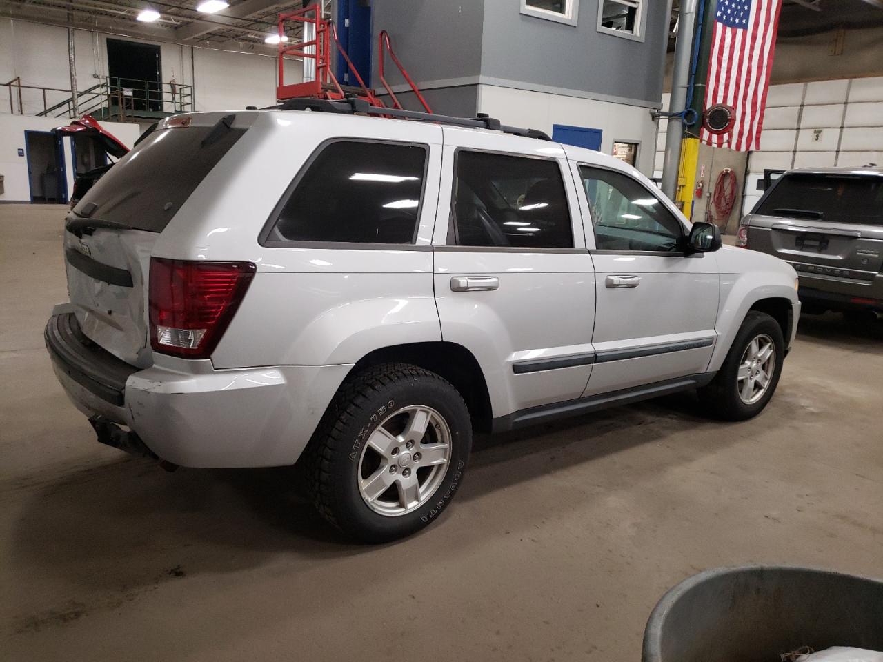2007 Jeep Grand Cherokee VIN 1J8GR48K07C579977 Copart auction photo, rear end damage thumbnail 3