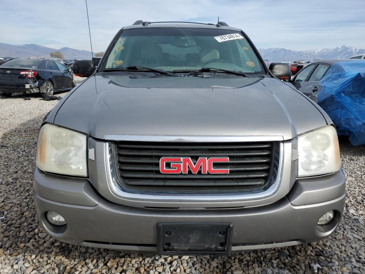 2005 GMC Envoy VIN 1GKET16S956164089 Copart auction photo, burn - engine damage thumbnail 5