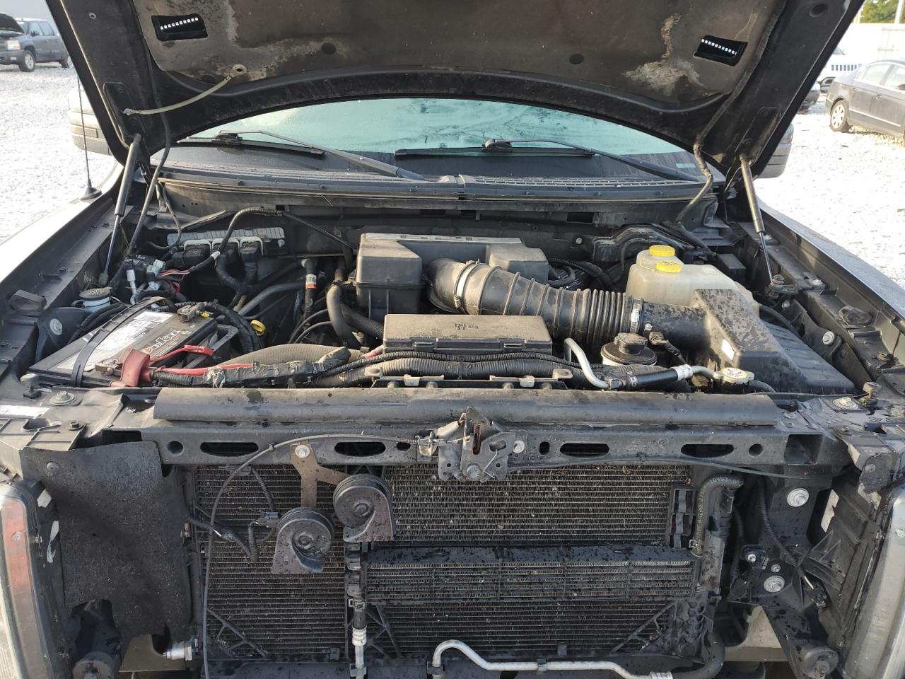 2014 Ford F-150 VIN 1FTFW1R69EFC92645 Copart auction photo, all over damage thumbnail 12