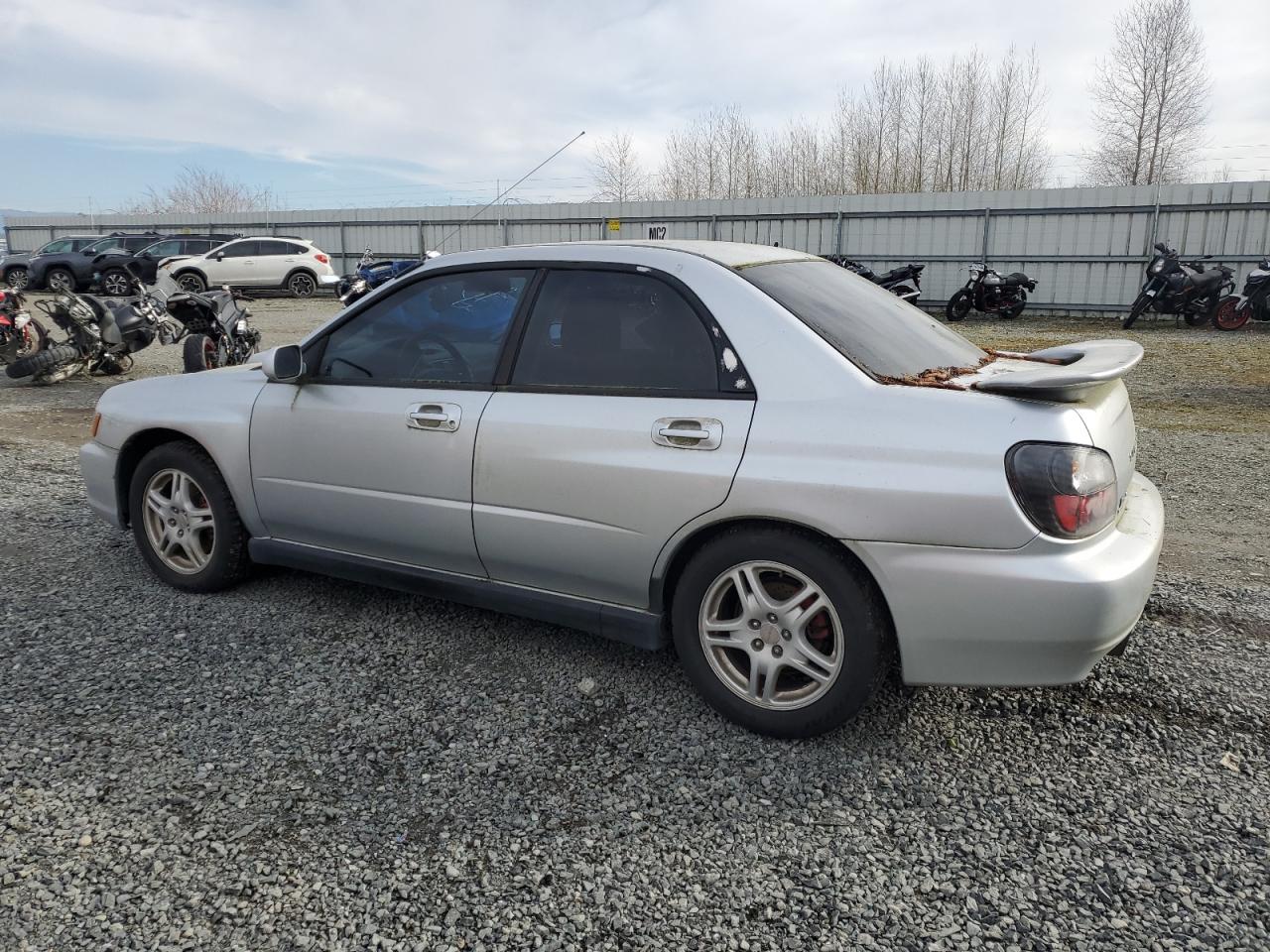 2003 Subaru WRX VIN JF1GD29653G512702 Copart auction photo, minor dent/scratches / damage history damage thumbnail 2