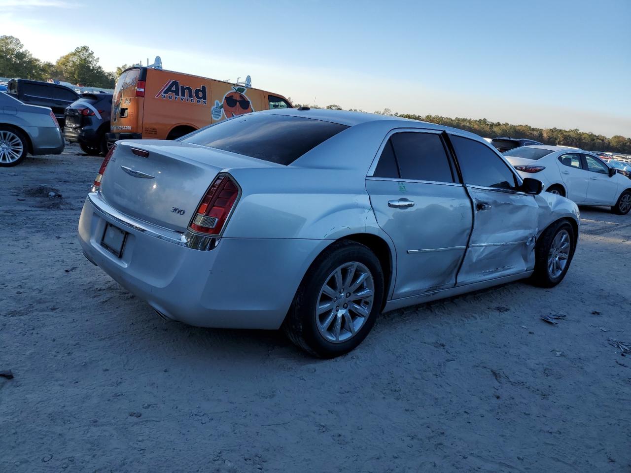 2012 Chrysler 300 VIN 2C3CCACG5CH310717 Copart auction photo, side / front end damage thumbnail 3