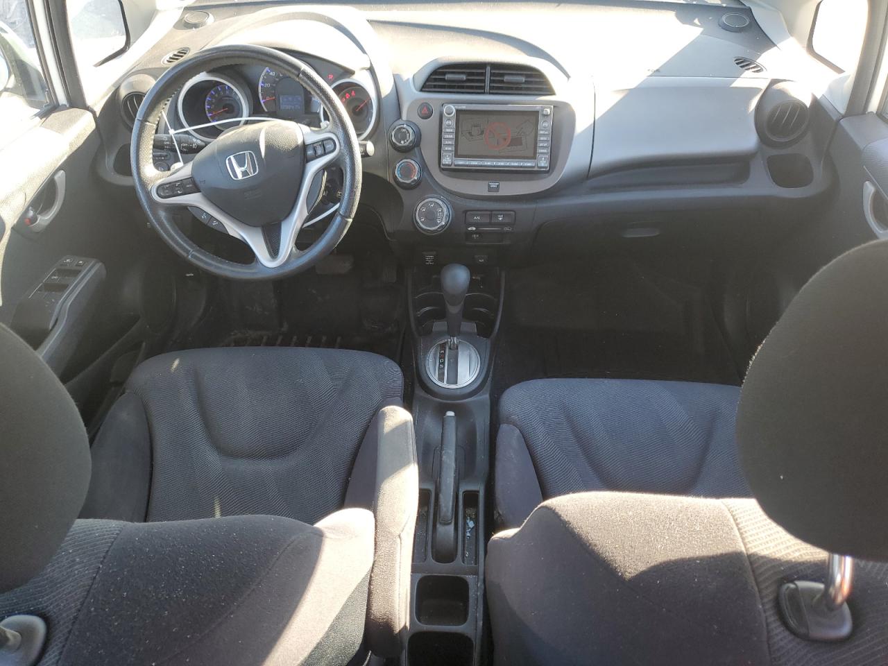 2011 Honda Fit VIN JHMGE8H63BC023246 Copart auction photo, rear end / minor dent/scratches damage thumbnail 8