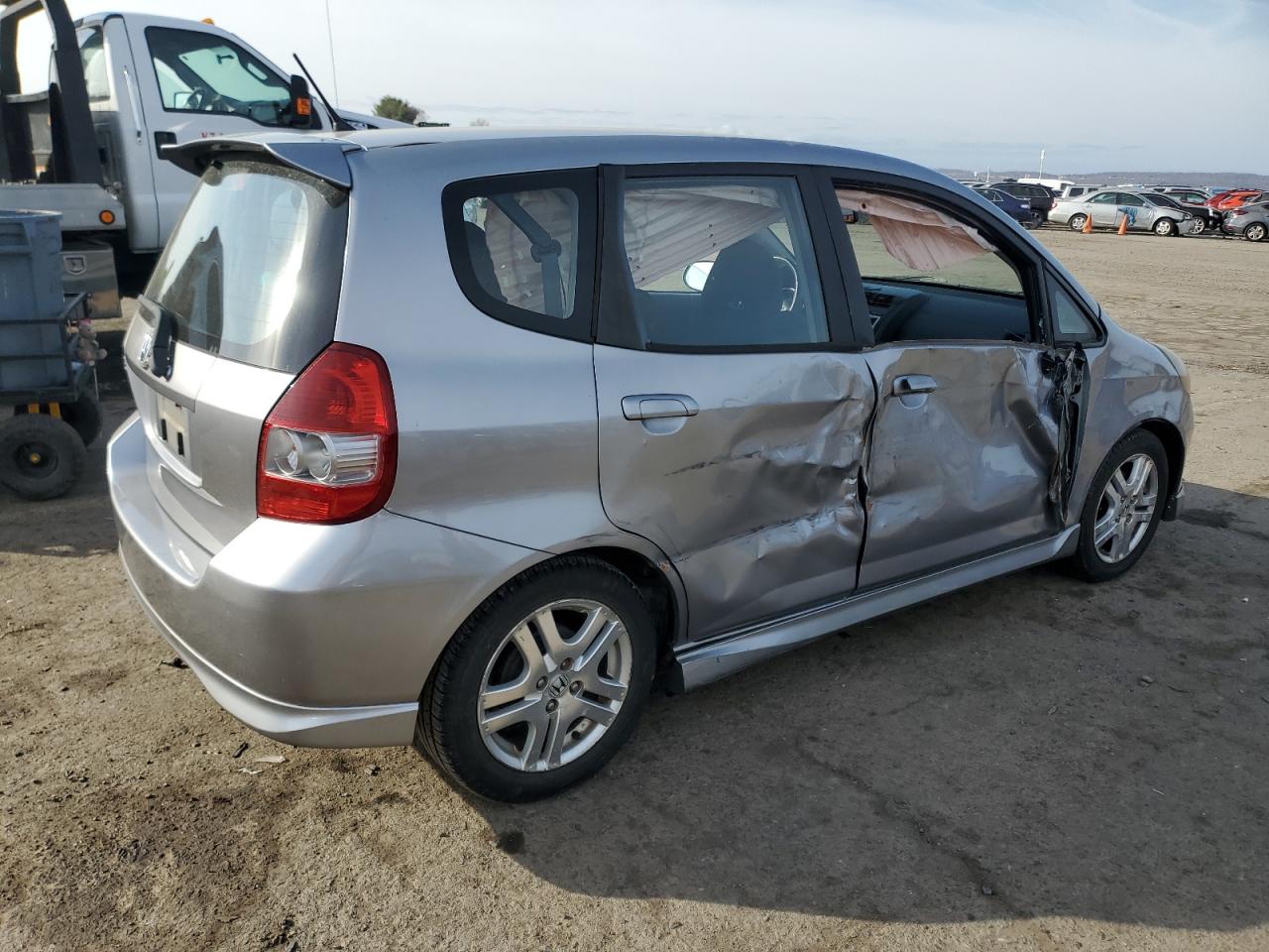 2007 Honda Fit VIN JHMGD37667S021883 Copart auction photo, side damage thumbnail 3