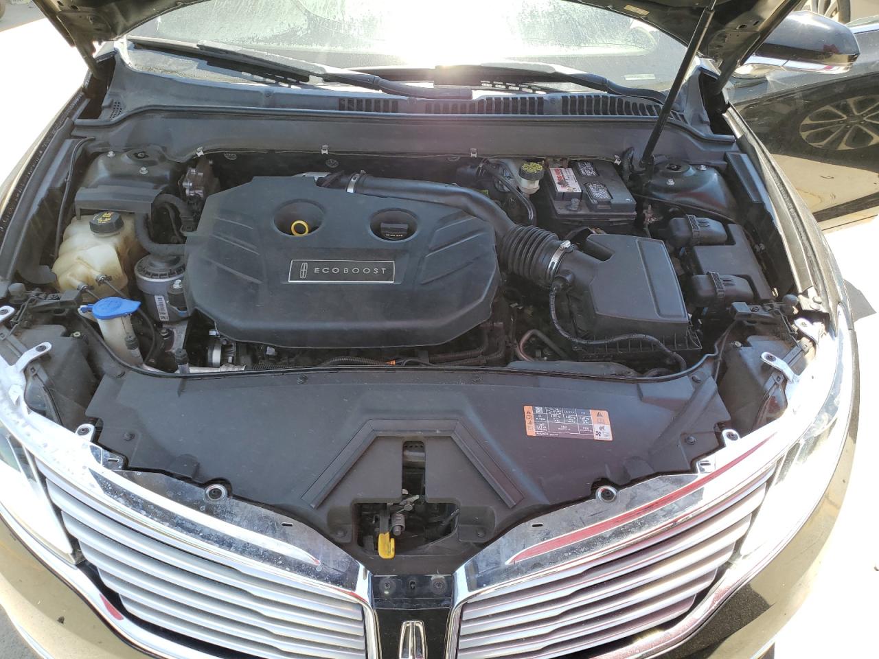 2016 Lincoln MKZ VIN 3LN6L2G98GR603222 Copart auction photo, burn - interior damage thumbnail 11